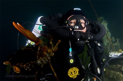 Blaquaman catches a small lobster on the HOLMES